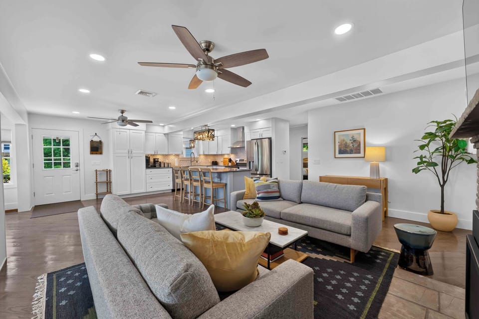 Open kitchen and living area designed for easy gathering and relaxing together