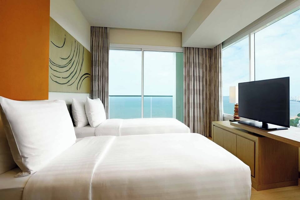 Family Suite, Multiple Beds, Sea View | Egyptian cotton sheets, premium bedding, minibar, in-room safe