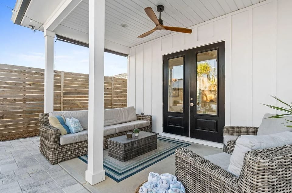 Unwind in your private covered patio with cozy seating and coastal breezes. The perfect spot to sip morning coffee or enjoy evening conversation under the ceiling fan.