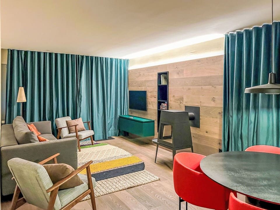 Furniture, Interior Design, Flooring, Wood, Floor, Textile, Room, Ceiling, Lighting, Table