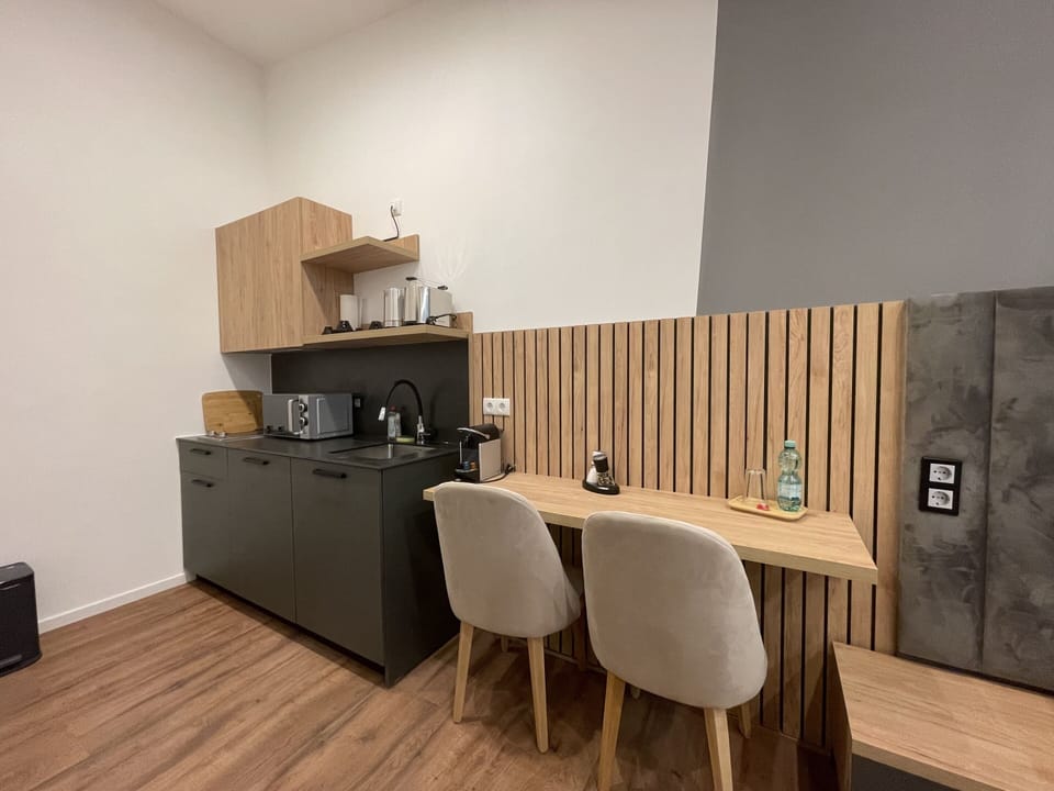 Studio, Private Bathroom | Shared kitchen | Fridge, microwave, stovetop, cookware/dishes/utensils
