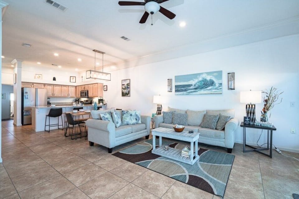 Open kitchen with dining and living area - overlooking the beach