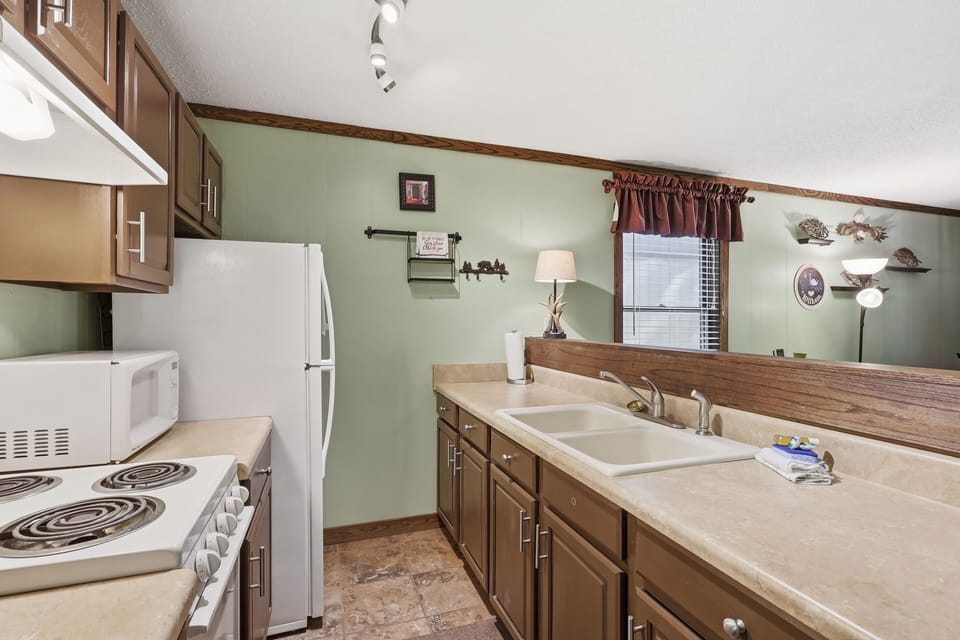 Bright, fully equipped kitchen with breakfast bar and generous counter space