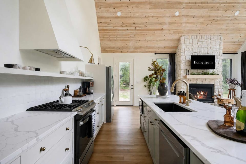 Chef’s Dream Kitchen – Fully stocked with high-end appliances and plenty of cabinetry, making cooking a breeze.

