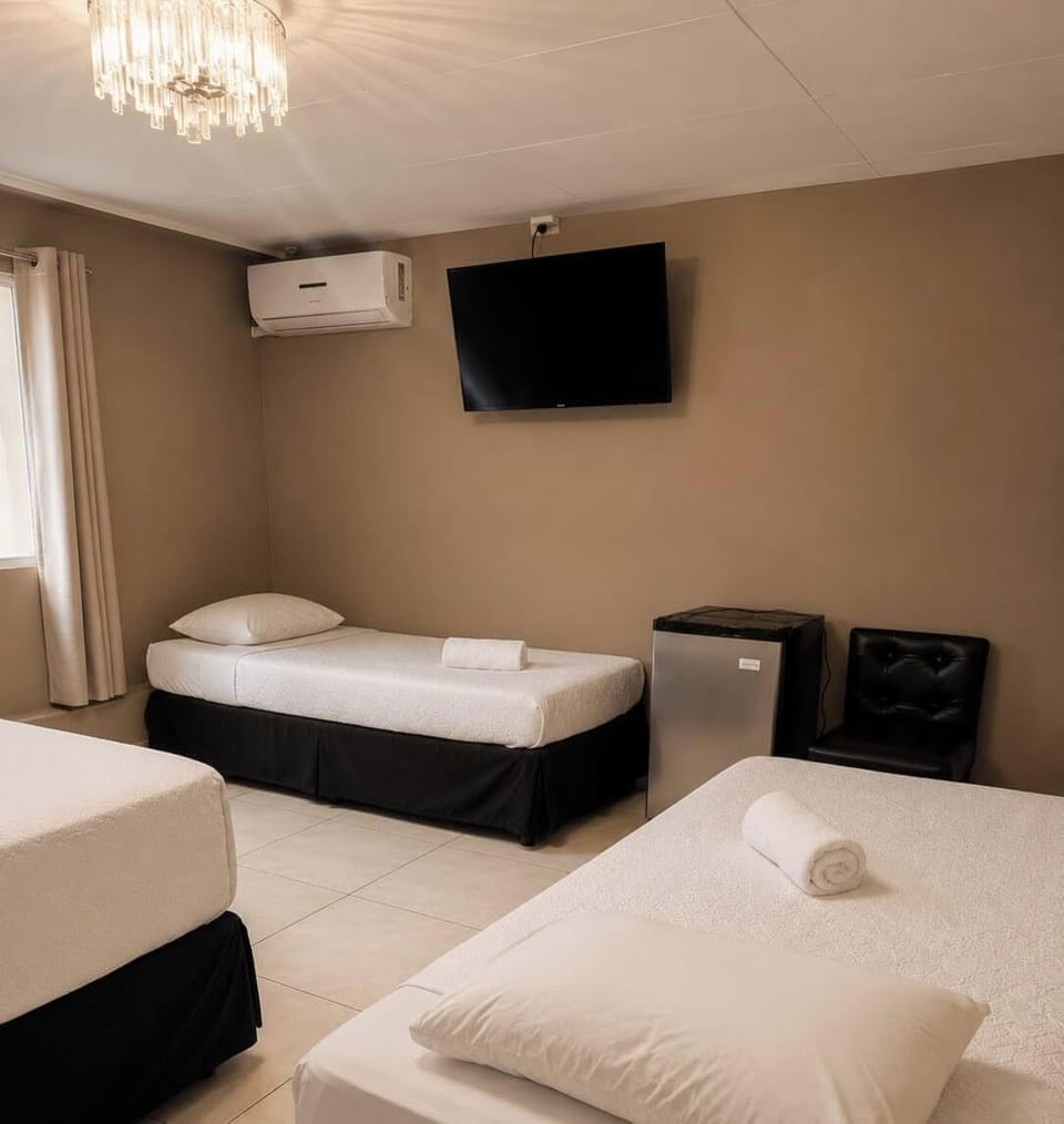 Comfort Quadruple Room | Down comforters, Select Comfort beds, desk, WiFi (free)
