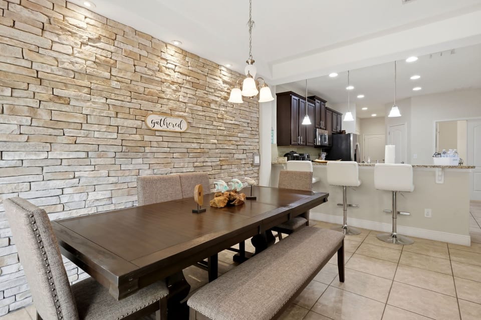 Spacious dining area with seating for family meals, game nights, and unforgettable vacation moments.