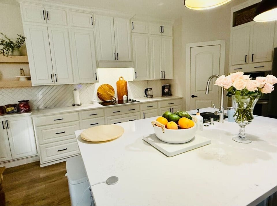 Ample counter space and full-size appliances make meal prep easy for groups of six.