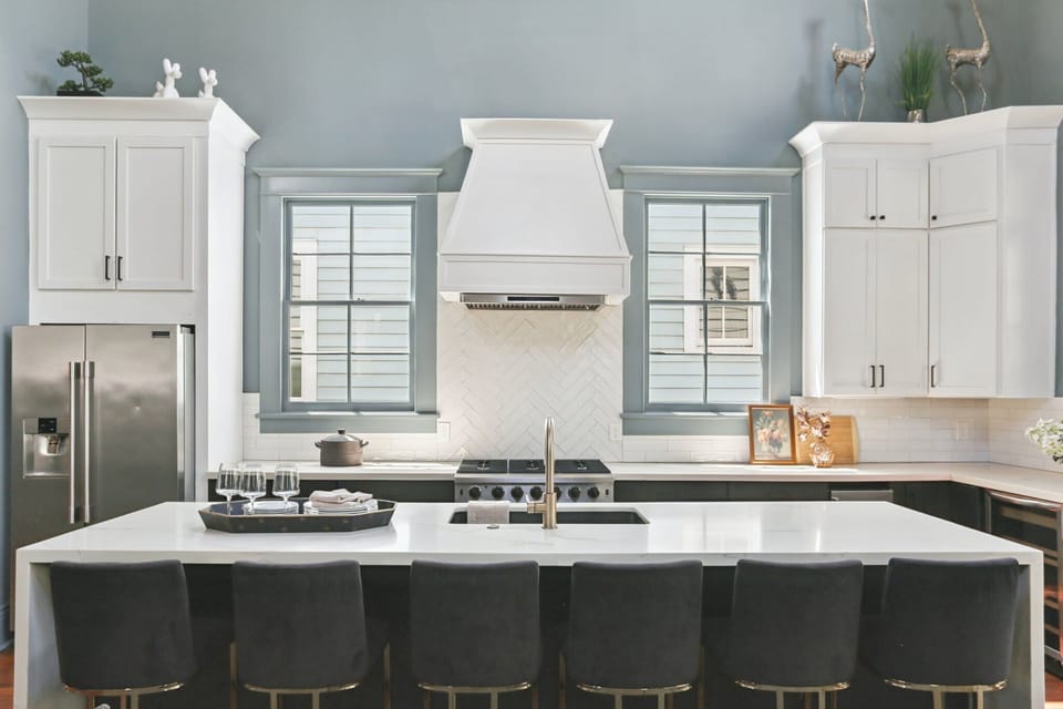 Home A | Chef’s Kitchen | First Floor | Fully Equipped | Gas Range | Bar Seating | Open Access to Living Area 