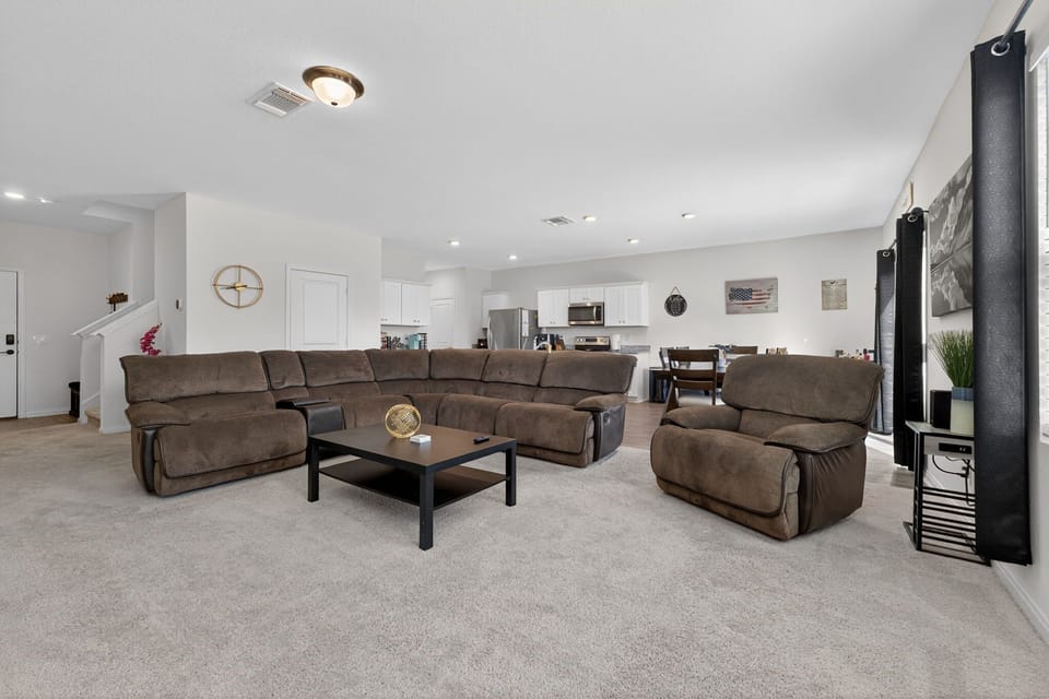 Spacious primary suite with dedicated workspace and Smart TV