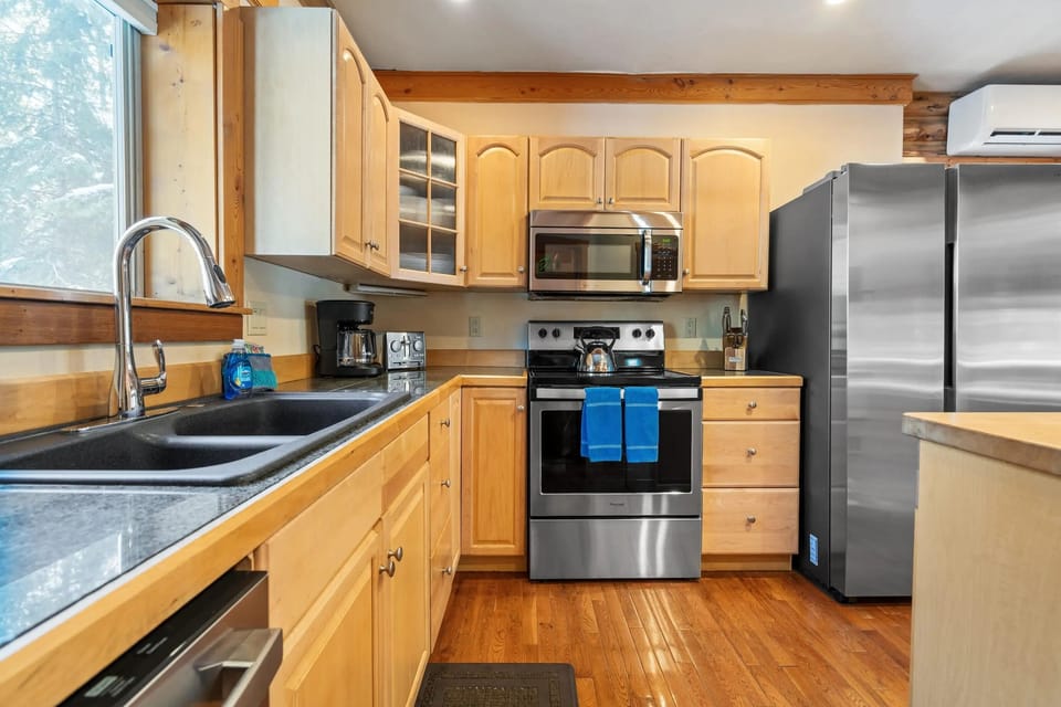 Kitchen, maple cabinetry and stainless appliances