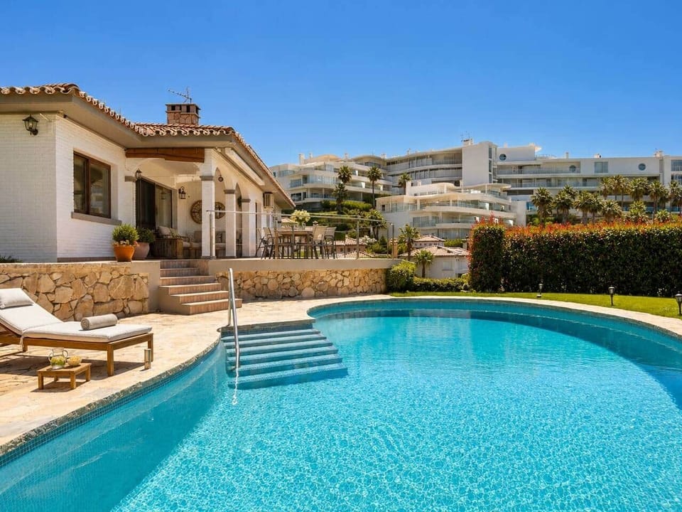 pool and sun loungers