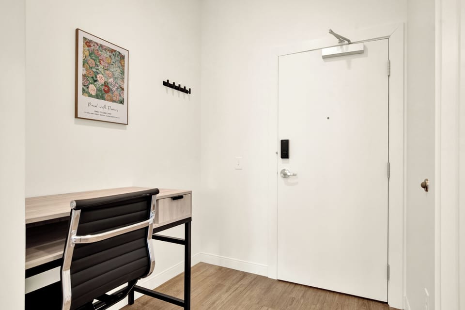Bright entryway with sleek workspace and modern minimalist style