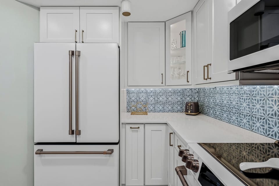 Completely Remodeled kitchen with high end appliances and gorgeous tile.