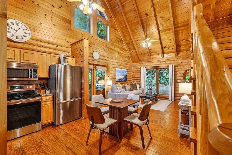 Fully stocked kitchen with stainless steel appliances and 4 person dining table