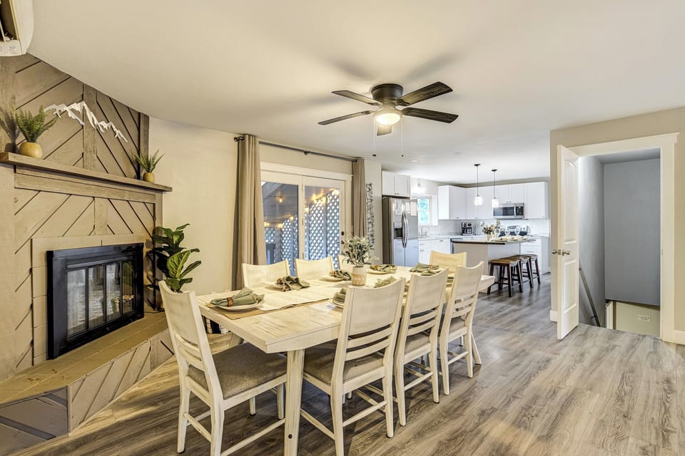 The dining area is designed for large groups with two dining tables that comfortably seat 16 guests