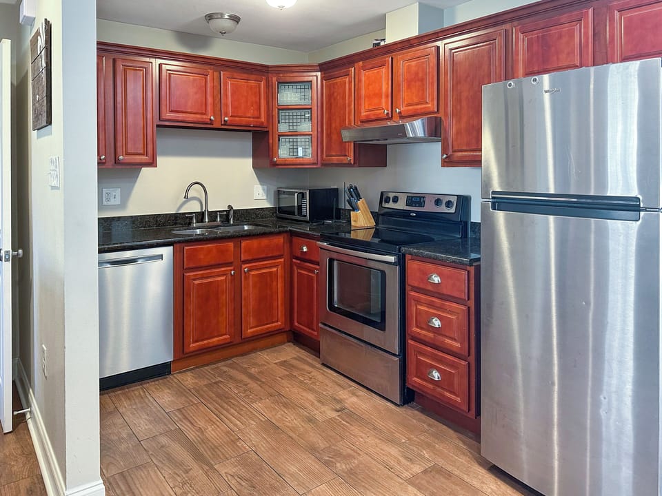 Modern kitchen with stainless appliances and ample cabinet space