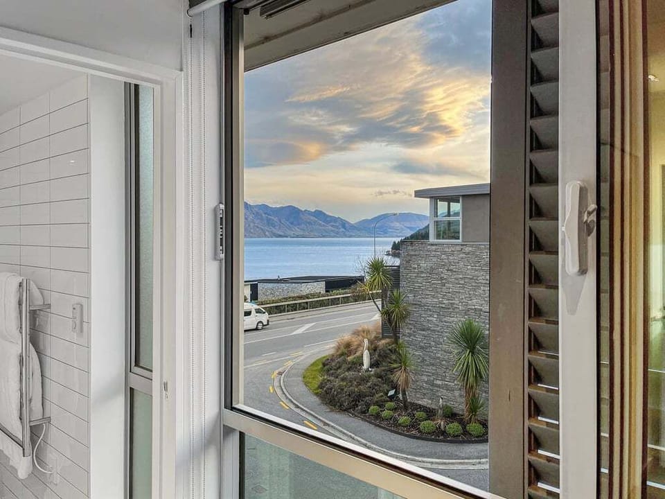 Enjoy views across Lake Wakatipu from the second bedroom.