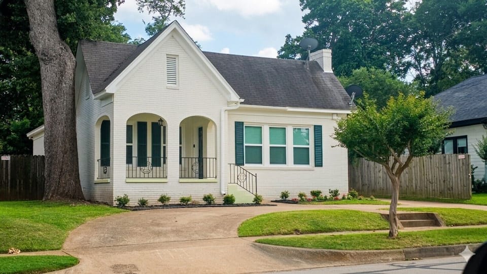 `Classic Tyler curb appeal — a freshly updated white cottage with a covered front porch, steps from UT Health, Mother Frances Hospital, and downtown dining.`