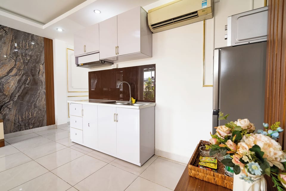 Junior Suite, City View | Private kitchen | Fridge, microwave