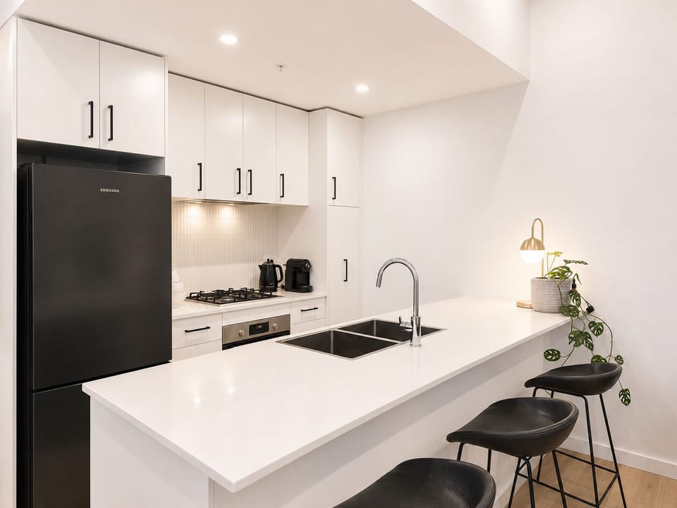Bright modern kitchen with island seating and sleek finishes