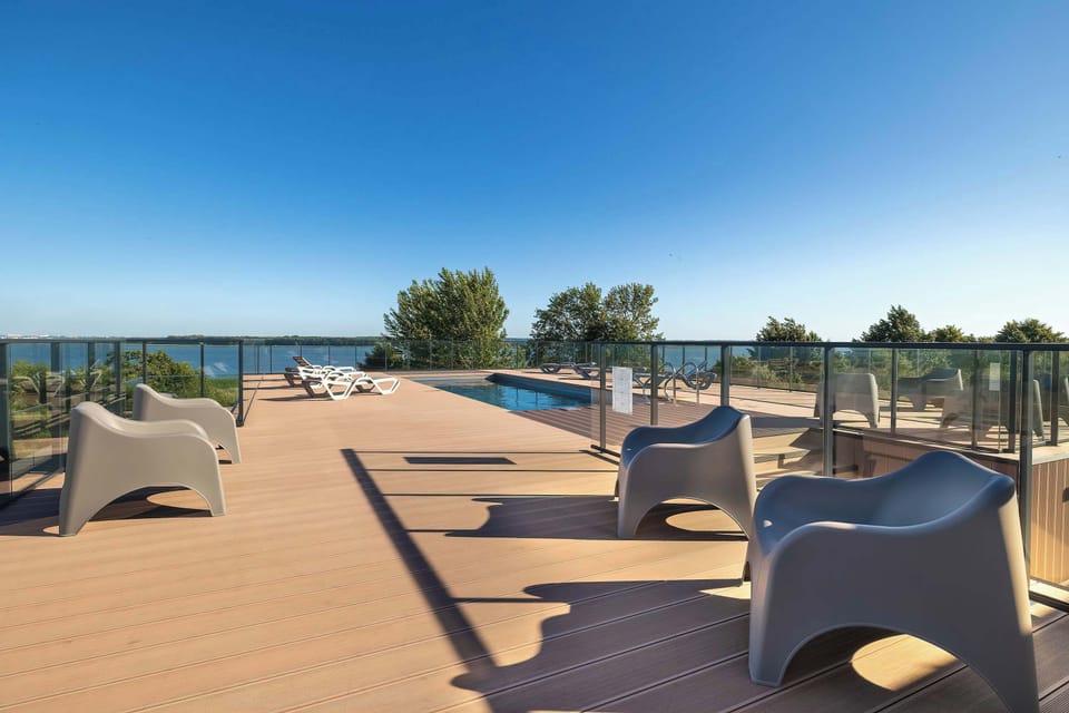 Additional view of the rooftop swimming pool and relaxation area.