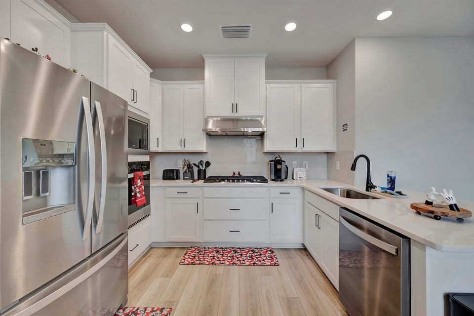 Stainless steel refrigerator, oven, stove, and dishwasher