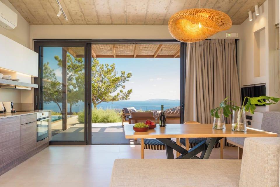 Stepping into Amberoza Villa I, you are welcomed by an open-plan living and kitchen area.