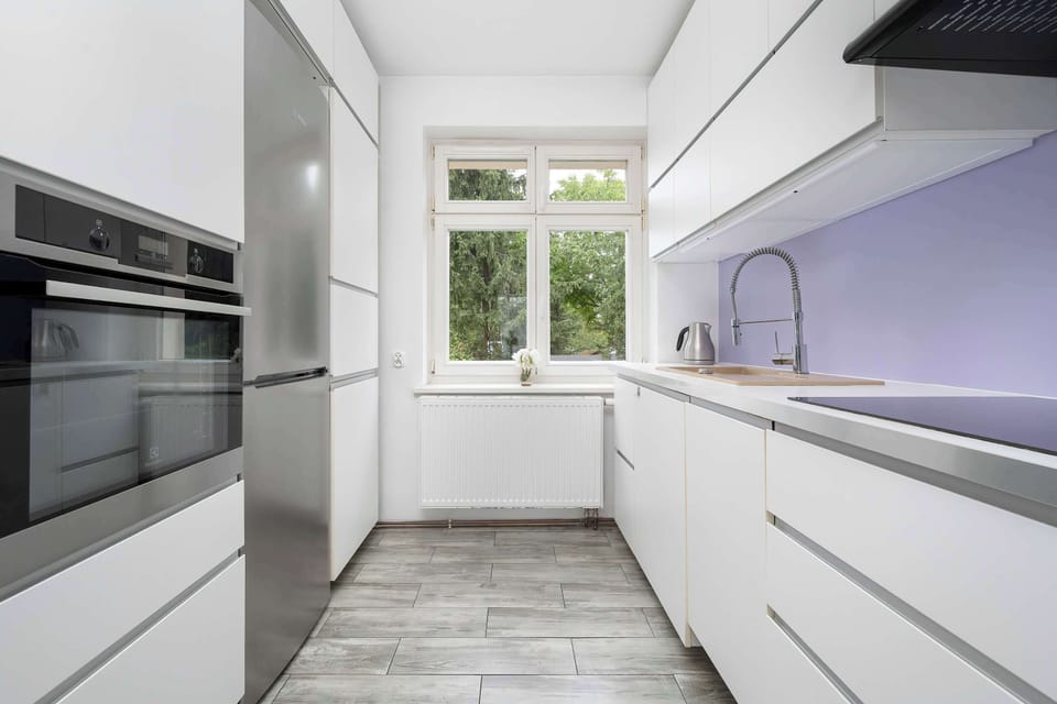 Cook and dine in style with the modern kitchenette and dining area.