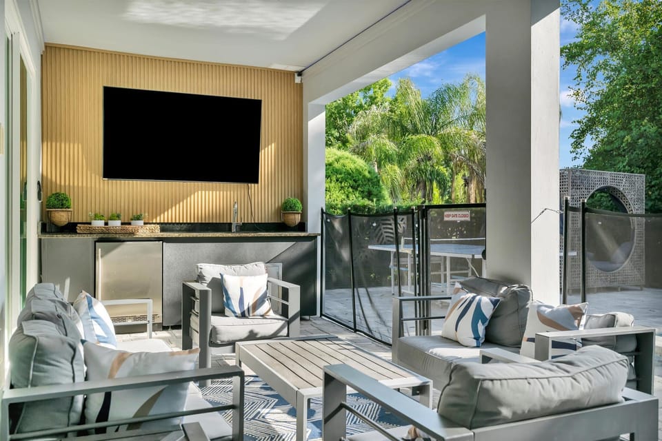 Outdoor Smart TV - great for movies under the stars and day time sports events! Additional fridge and outdoor sink