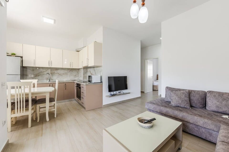 Living room and fully-equipped kitchen