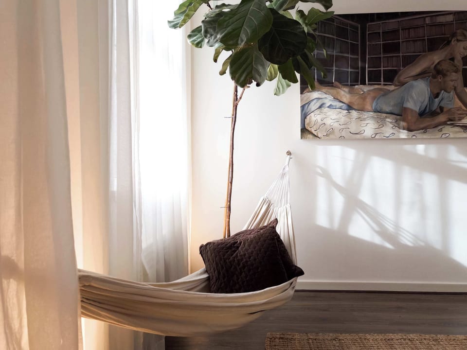 The hammock by the window — sway gently and let Spitalfields drift past.