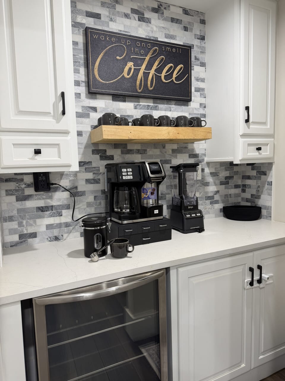 Stylish coffee bar with multiple brew options and modern kitchen finishes