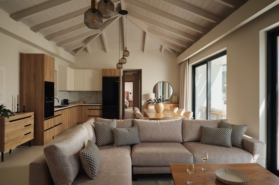 A refined living room setting offers relaxed comfort, with couch available for t