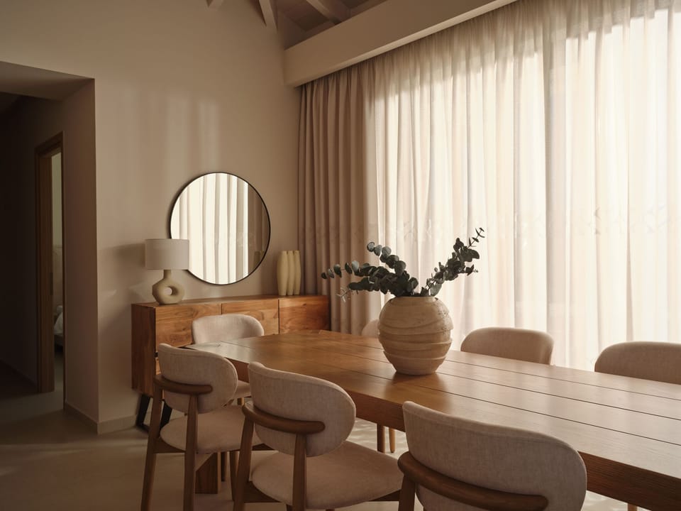 The elegant dining table is featured, inviting culinary movements with loved one