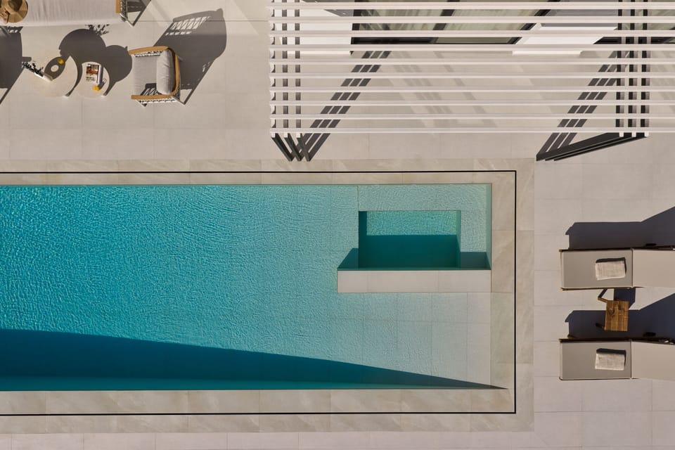 Bird's eye view from the pool area, offering a serene setting for elevated loung
