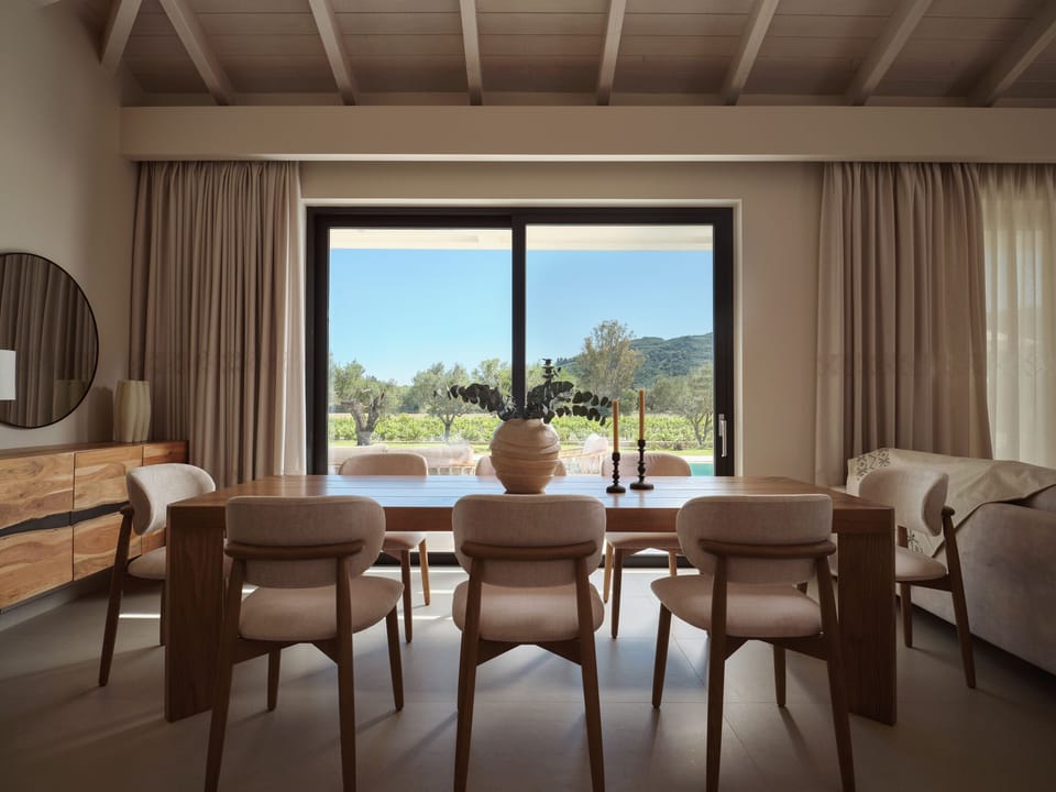 The living room and dining area come together in an open-plan design, beautifull