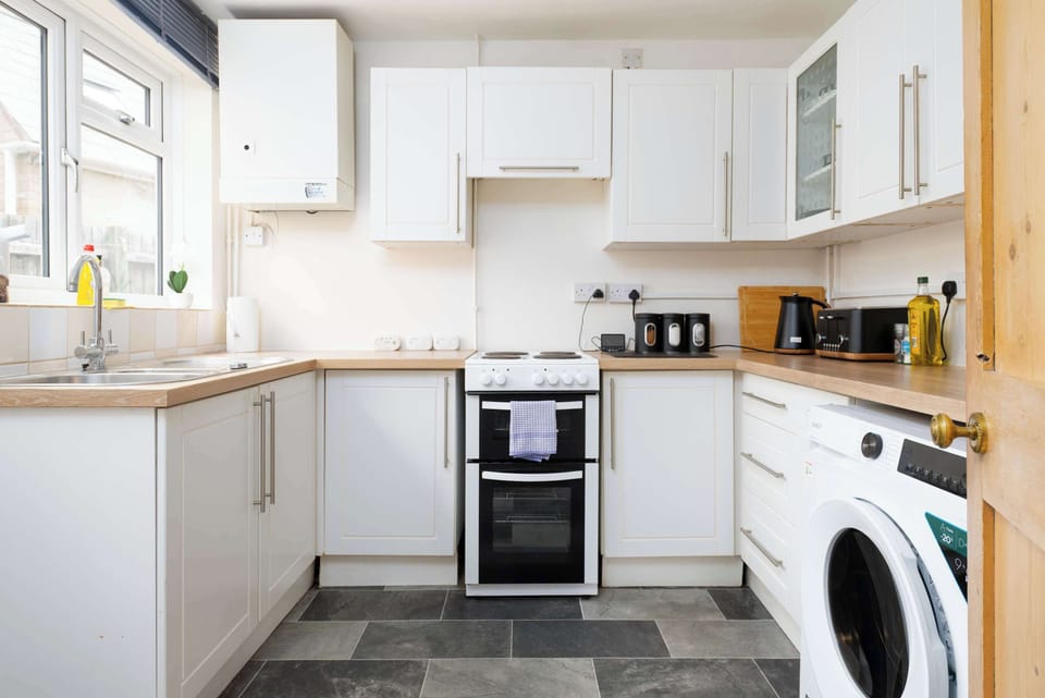 Featuring modern appliances, ample worktop space, and all the essential cookware, crockery and utensils