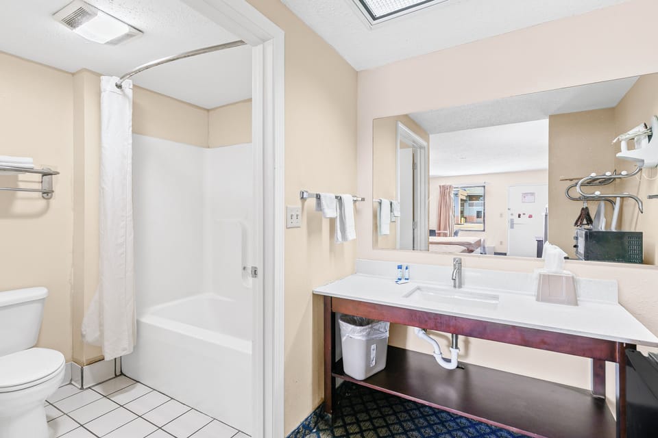 Room, 2 Queen Beds, Smoking | Bathroom | Free toiletries, towels