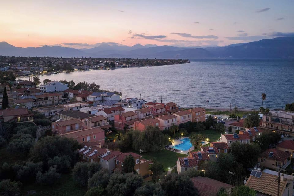 Sunset views across the coastline and Corinthian Gulf, offering beautiful colours and unforgettable evening scenery.