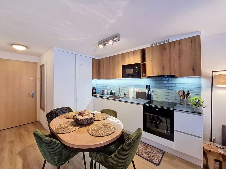 Interior Design, Furniture, Flooring, Floor, Wood, Ceiling, Room, Cabinetry, Apartment, Lighting