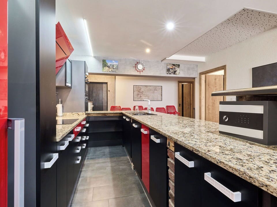 Kitchen, Countertop, Interior Design, Flooring, Kitchen Appliance, Major Appliance, Cabinetry, Wood, Furniture, Ceiling