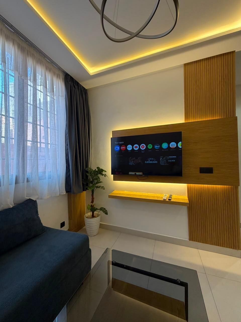 Deluxe Studio, City View | Living area | 45-inch Smart TV with digital channels