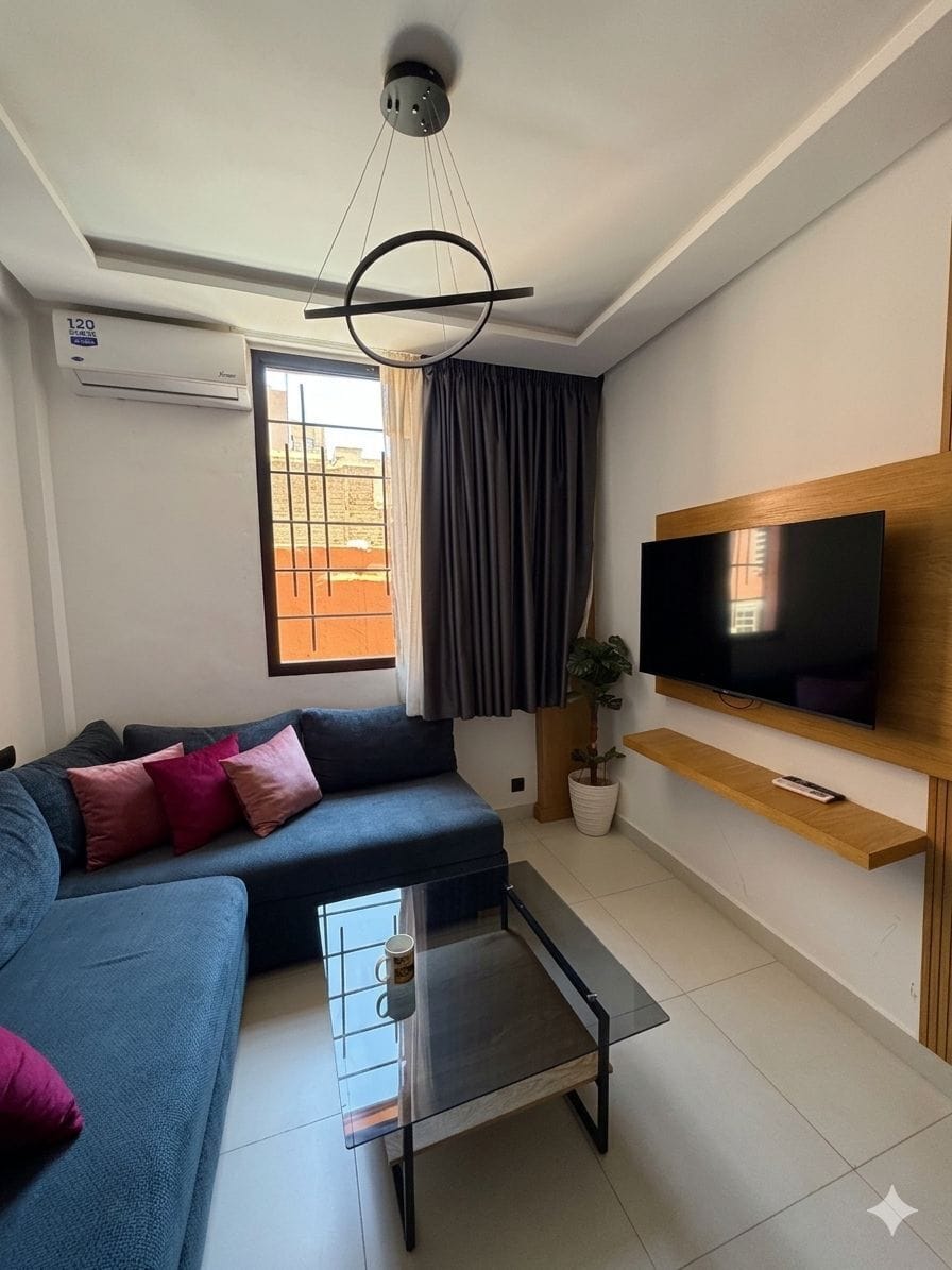 Deluxe Studio, City View | Living area | 45-inch Smart TV with digital channels