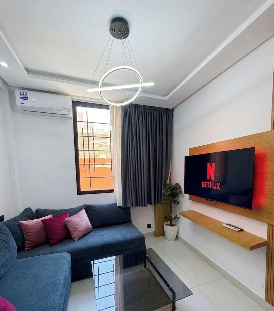 Deluxe Studio, City View | Living area | 45-inch Smart TV with digital channels