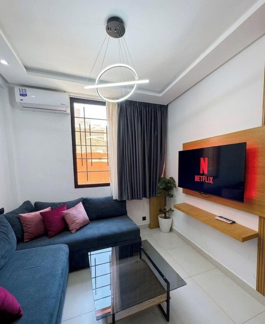 Deluxe Studio, City View | Living area | 45-inch Smart TV with digital channels