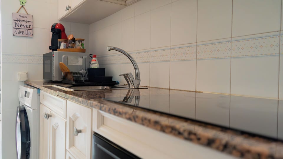 Apartment, Balcony, Garden View | Private kitchen | Espresso maker, coffee/tea maker