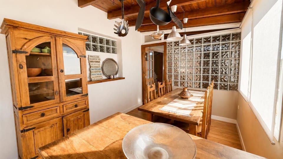 A warm rustic dining area with wooden furniture and charming country-style details.