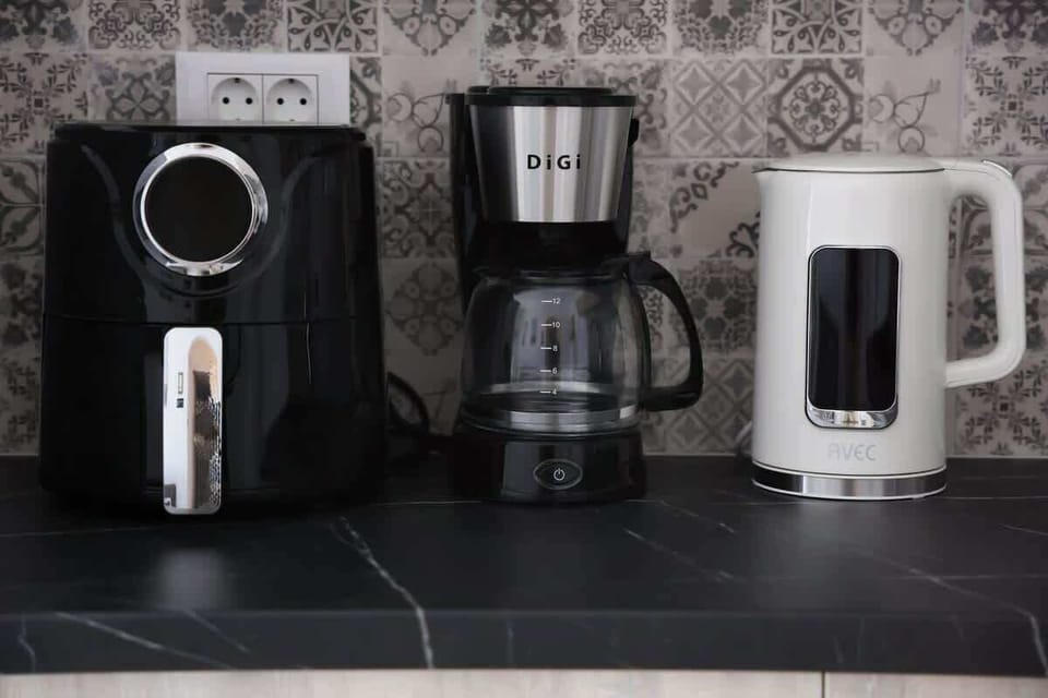 Coffee Station with Espresso Machine and Complimentary Amenities