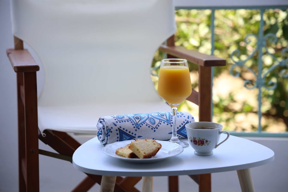 Balcony Breakfast Table with Garden Views