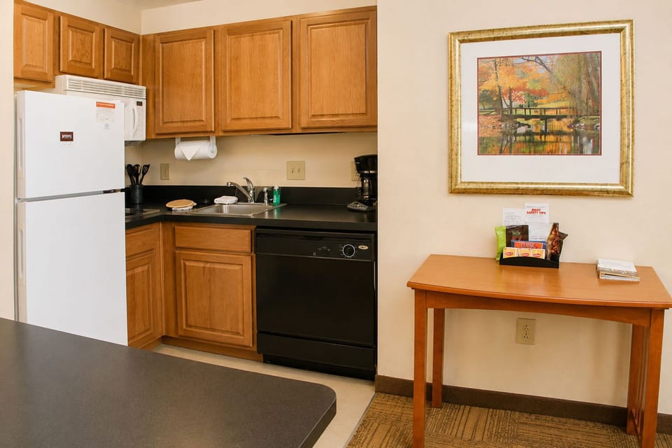 Bright kitchen with stylish cabinetry and convenient countertop space.